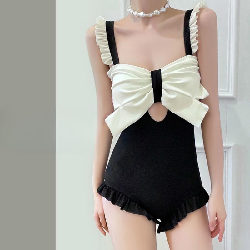 かわいい蝶結びディテール水着レディースエレガントな背中の開い - Costumes のレビューと価格